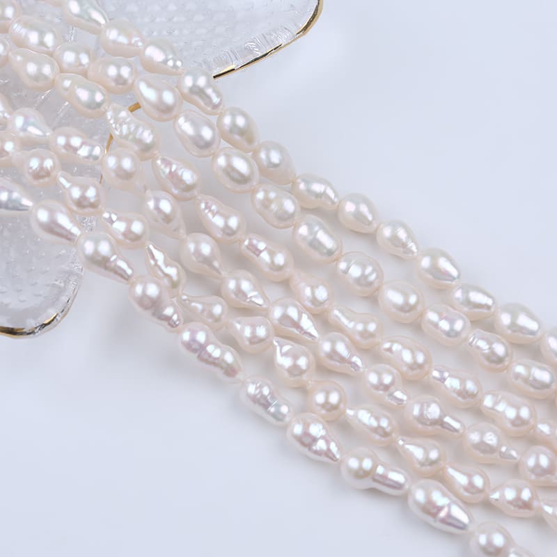 7-9mm White Drop Baroque Freshwater Pearls Strands