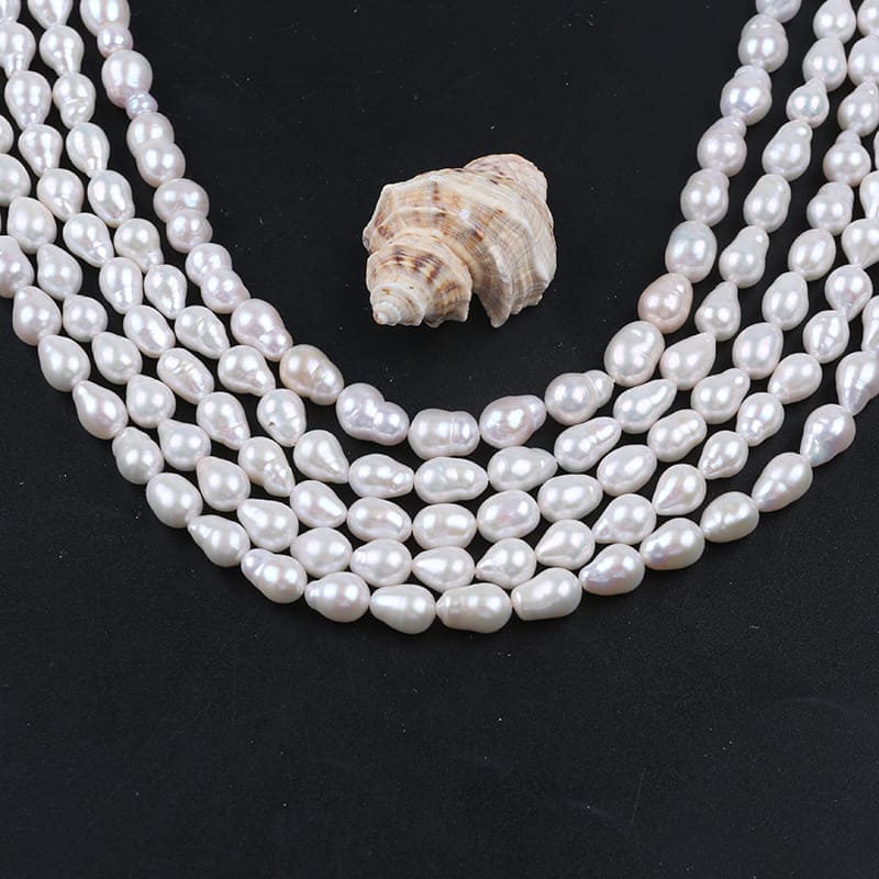 7-9mm White Drop Baroque Freshwater Pearls Strands
