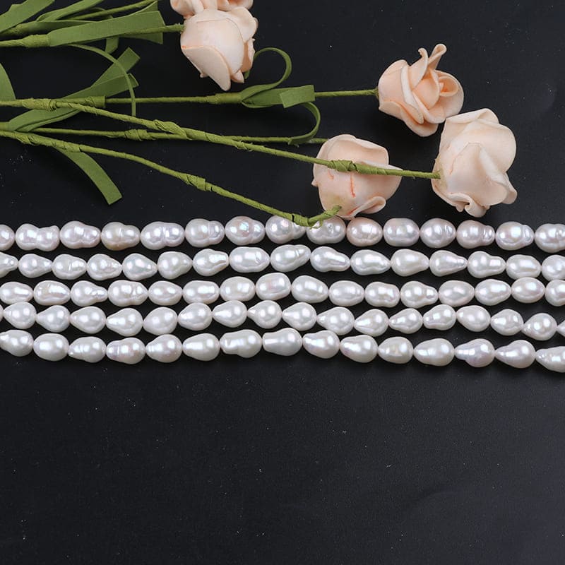 7-9mm White Drop Baroque Freshwater Pearls Strands