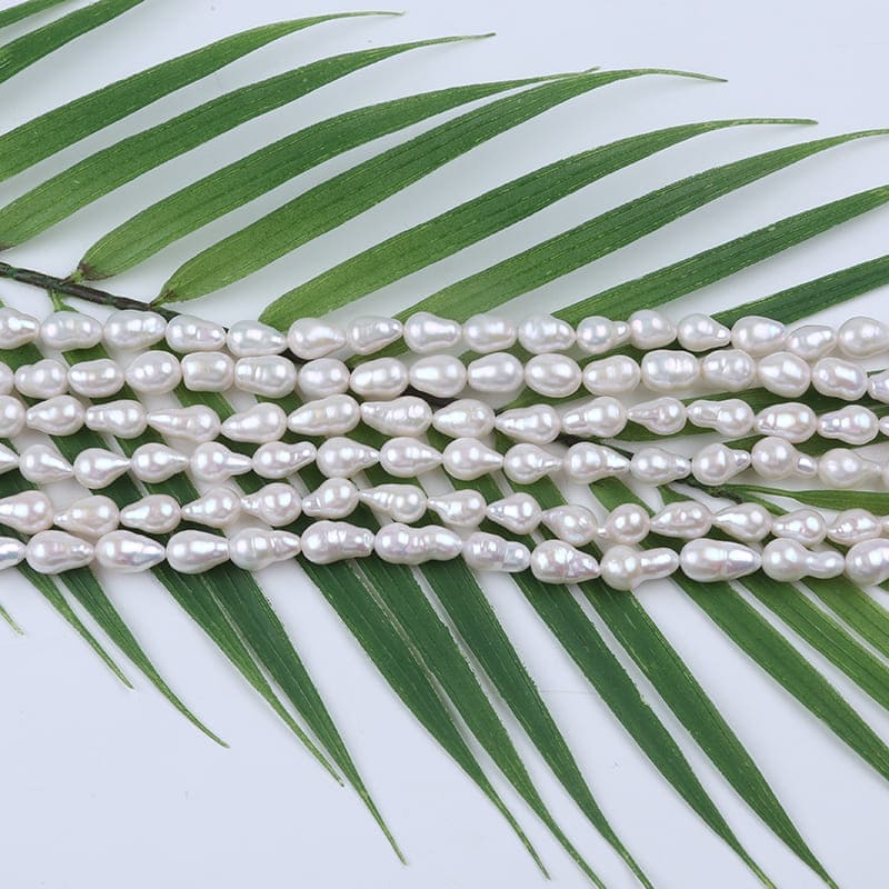 7-9mm White Drop Baroque Freshwater Pearls Strands