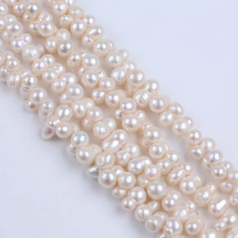 8-10mm White Freshwater Baroque Pearl Strands