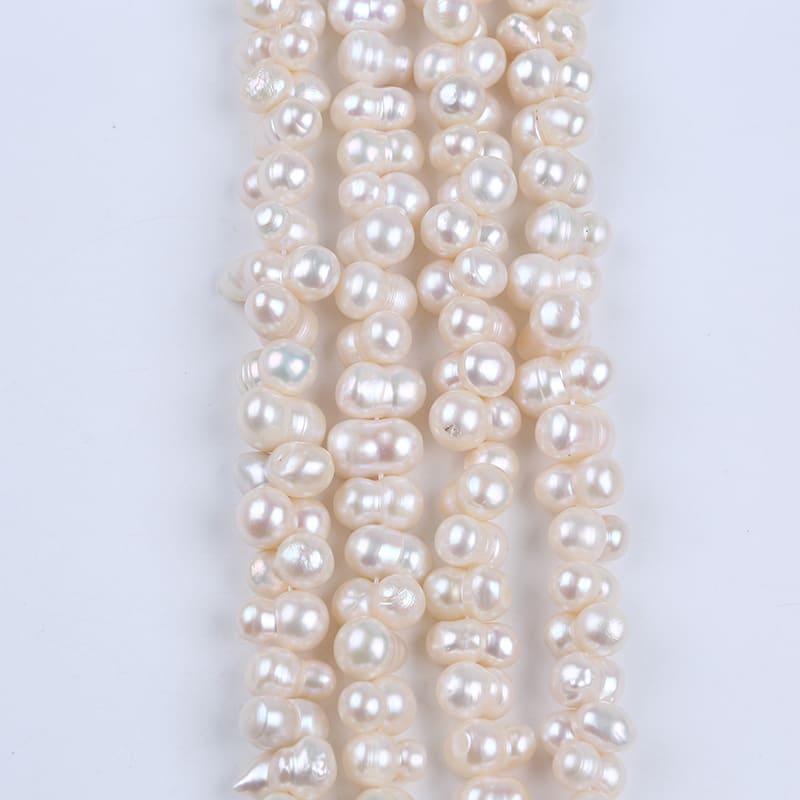 8-10mm White Freshwater Baroque Pearl Strands