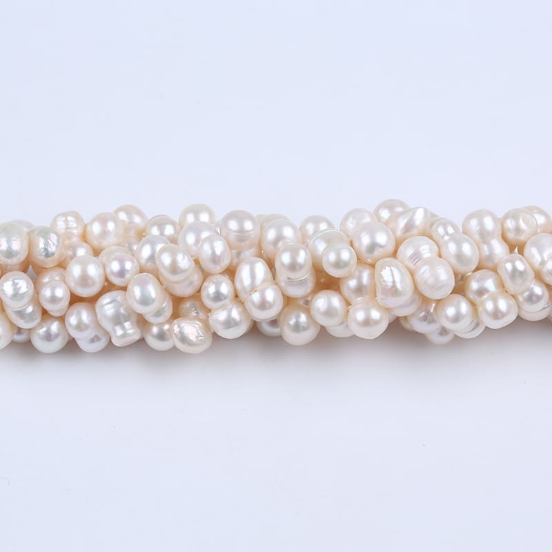 8-10mm White Freshwater Baroque Pearl Strands